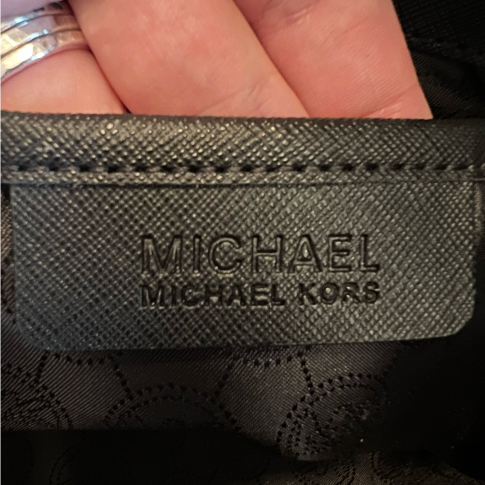 Black hard leather Michael kors handbag. 14 inches wide by 10 inches tall. - Picture 3 of 7